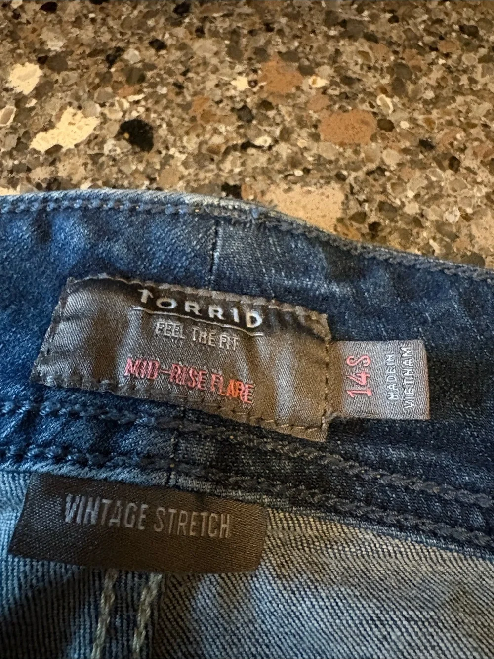 Torrid Vintage Stretch Mid-Rise Flare Jeans Blue Distressed Raw Hem Size 14S